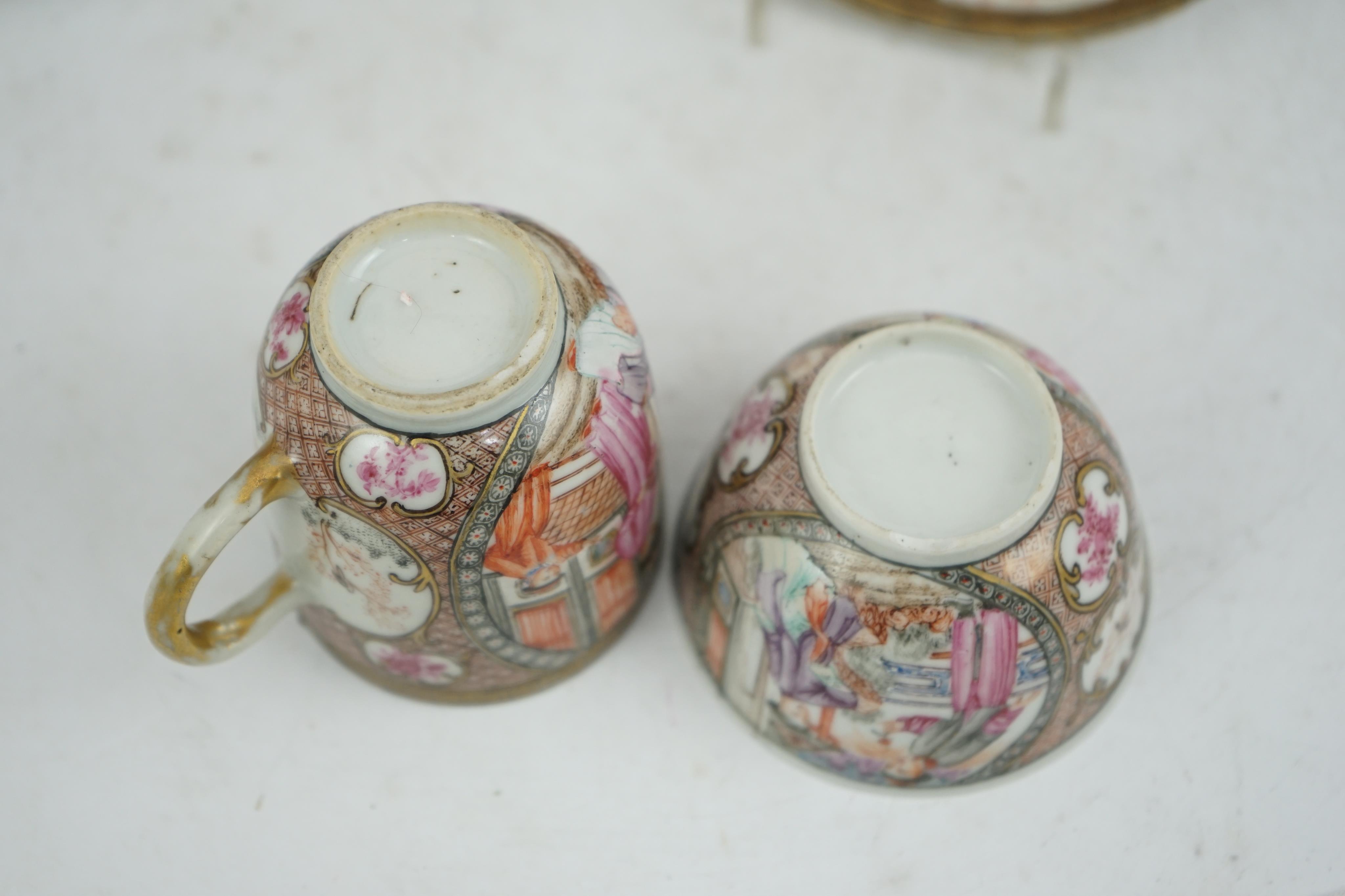 A Chinese ‘mandarin’ pattern tea bowl, coffee cup and saucer, Qianlong period